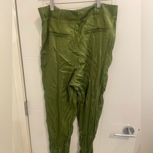 Brand new Anthropologie pants, green with black on sides
